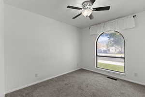 Bedroom with carpet flooring and ceiling fan