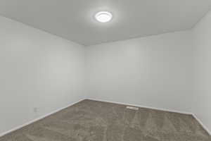 Spare room with carpet