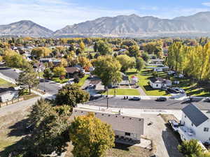 Aerial view of residential area with a mountain backdrop