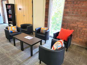 Community lobby with brick wall