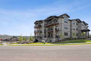 View of building exterior featuring a mountain view