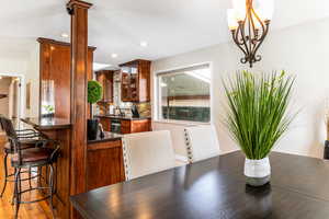 Dining room featuring recessed lighting and Madrone wood flooring