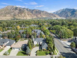 Aerial view of residential area featuring a mountain backdrop