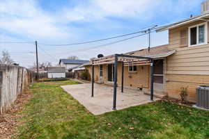 Fenced backyard featuring a storage shed, a patio, and a pergola