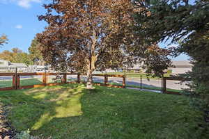 View of yard featuring a gate