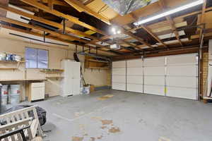 Garage featuring a garage door opener
