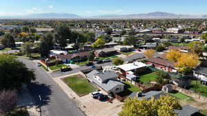 Aerial view of residential area with a mountain backdrop