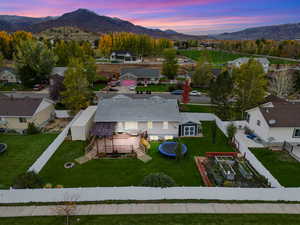 Aerial perspective of suburban area featuring a mountainous background