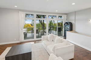 Living room featuring recessed lighting and wood finished floors