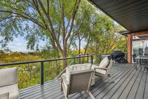Wooden terrace with grilling area