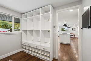 Mudroom featuring dark wood-type flooring and recessed lighting