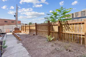 View of fenced backyard