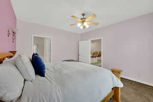 Bedroom with carpet and a ceiling fan