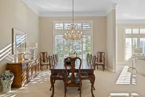 Formal dining room with stunning chandelier