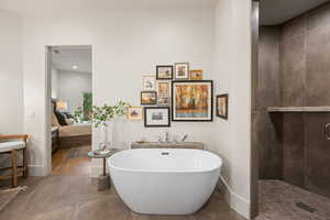 Full bathroom featuring a soaking tub, ensuite bath, a shower stall, tile patterned flooring, and recessed lighting