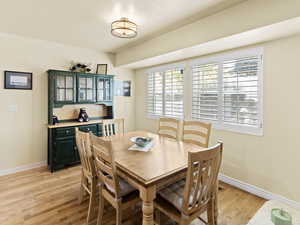 Off kitchen. Green cabinet stays.