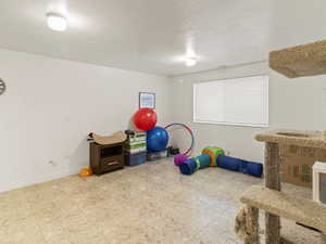 Gym room/rec room down.