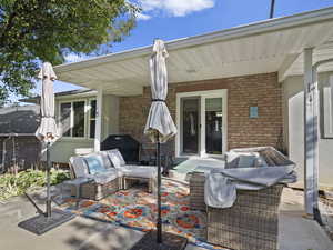 View of patio / terrace featuring area for grilling and an outdoor hangout area