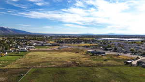 Aerial view of residential area featuring a mountain backdrop