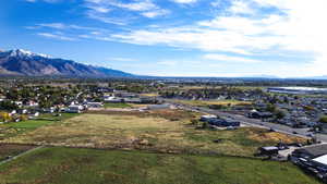 Aerial view of residential area featuring a mountain backdrop