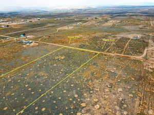 View of rural area featuring property boundaries highlighted and a mountainous background