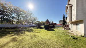 View of fenced backyard