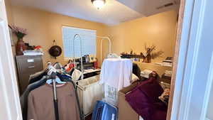 Office featuring a textured ceiling