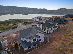 Aerial view at dusk of a water and mountain view