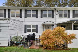 View of back patio with temporary fencing