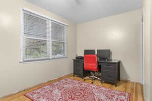 Bedroom 2/Office featuring original hardwood flooring