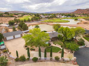 Aerial view of residential area featuring a water and mountain view
