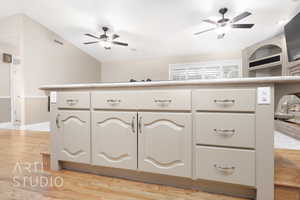 Detailed view of ceiling fan and wood finished floors