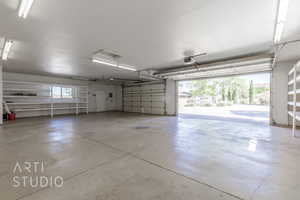 Garage featuring a garage door opener