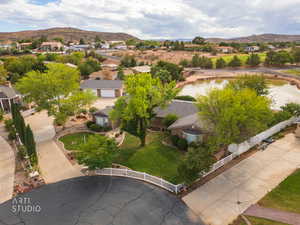 Aerial view of residential area featuring a water and mountain view