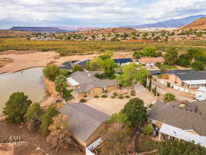 Aerial perspective of suburban area featuring a water and mountain view