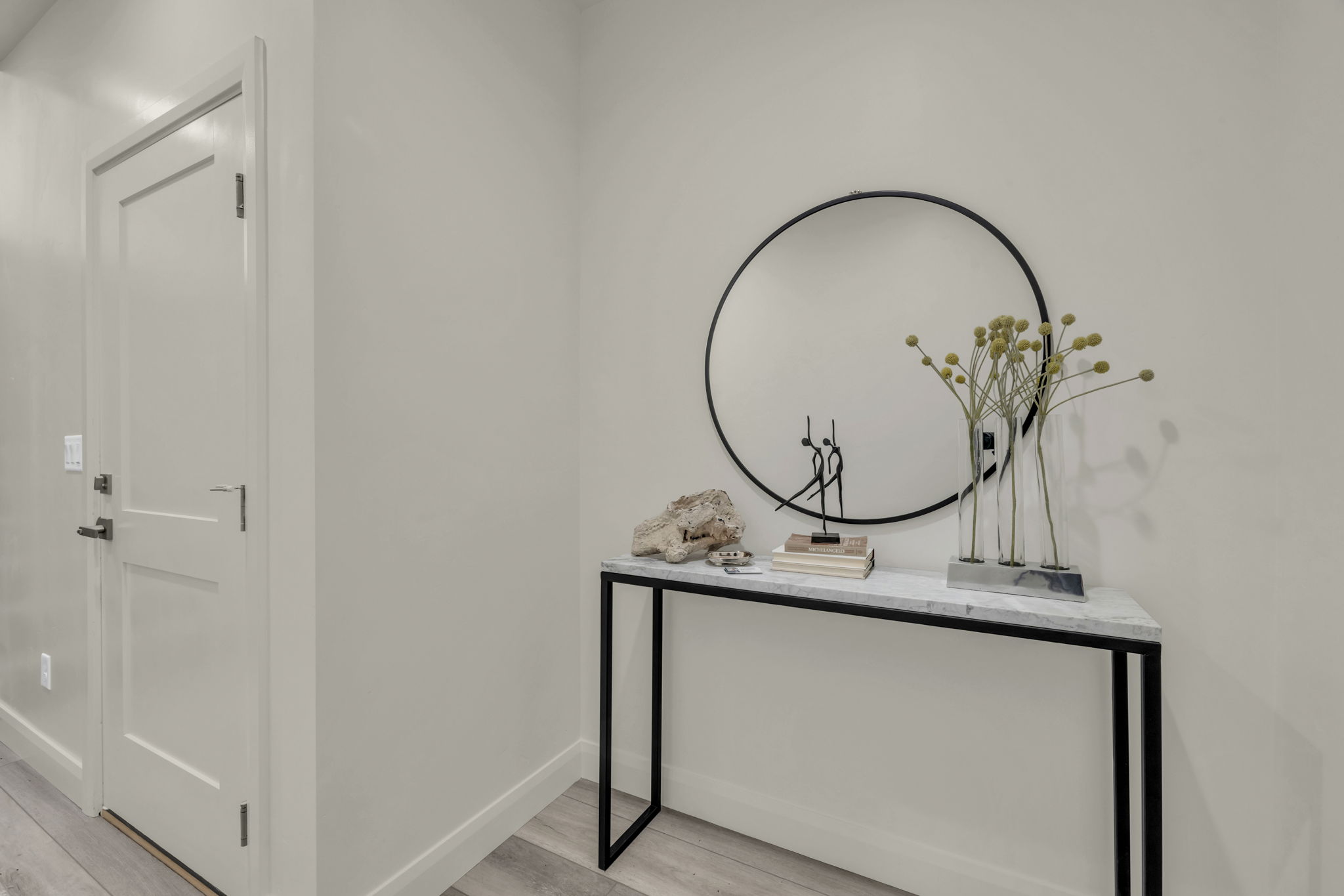 Detailed view of wood finished floors and baseboards