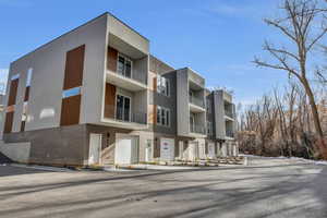 View of building exterior with an attached garage