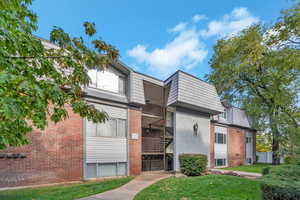 View of building exterior featuring stairs