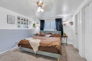 Bedroom with carpet floors and ceiling fan