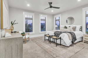 Bedroom with ceiling fan, multiple windows, recessed lighting, and light colored carpet