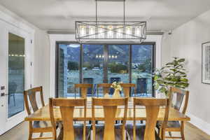Dining area with light wood finished floors