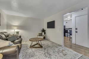 Living room with light wood-style floors