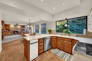 Bright & happy kitchenwith large windows, lots of light, view of back yard and recessed lighting.