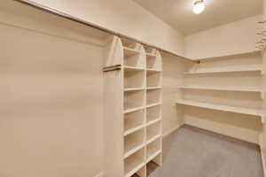 Huge Master Closet with built-in shelving.