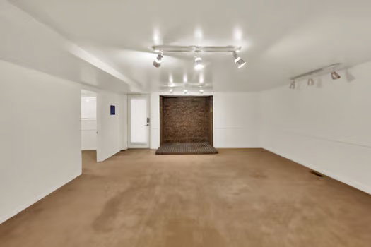 Bsmt Apartment Family Room and Dining Rm (Nice and Open) featuring adjustable rail lighting