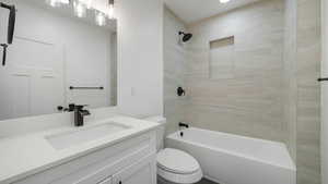 Full bathroom with vanity and  shower combination