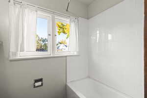 Bathroom with tub / shower combination