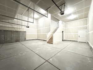 Garage featuring a garage door opener