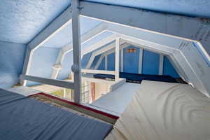 So many memories and stories will be told in the bunkhouse bed loft! Room for three beds or pallets!