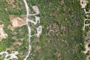 Aerial view of property and surrounding area.